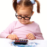 Little girl plays with money_classiblogger_image